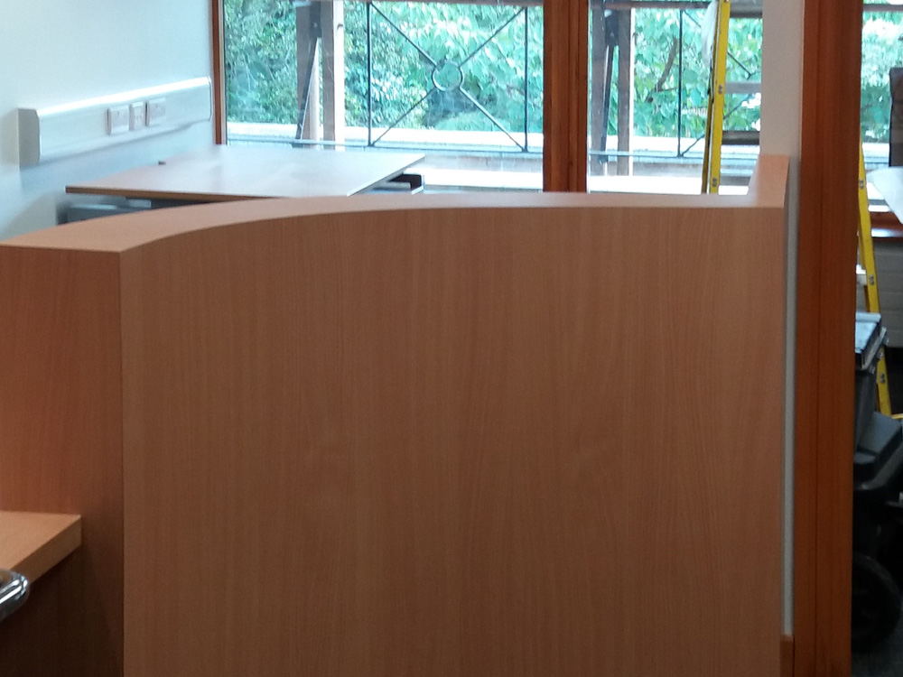 Hospital-Reception-Curved-Desk-Fitting